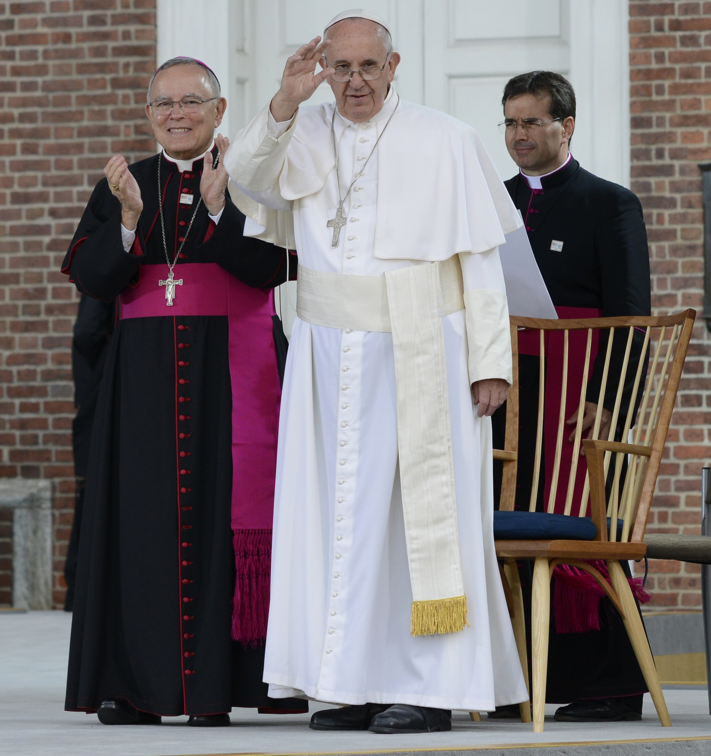 Pope Francis waves to the crowd at Independence Hall in Philadelphia, Saturday, Sept. 26, 2015. The pontiff discussed immigration during his address. (U.S. Coast Guard photo by Chief Petty Officer Nick Ameen)