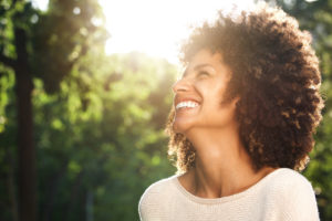 Woman Smiling in Sunshine